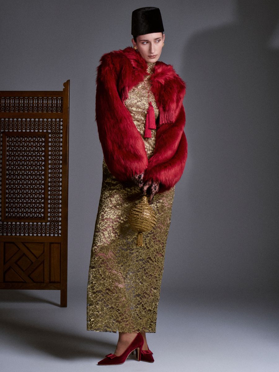 Model wearing black velvet fez by Nerida Fraiman for Azzopardi Studio Autumn Winter 2026 collection.