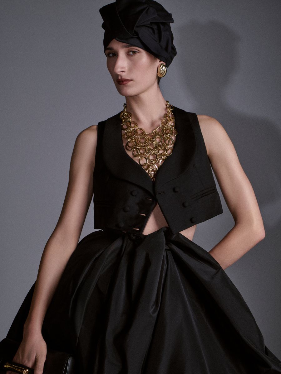 Model wearing black cotton twist-front turban by Nerida Fraiman for Azzopardi Studio Autumn Winter 2026 collection.