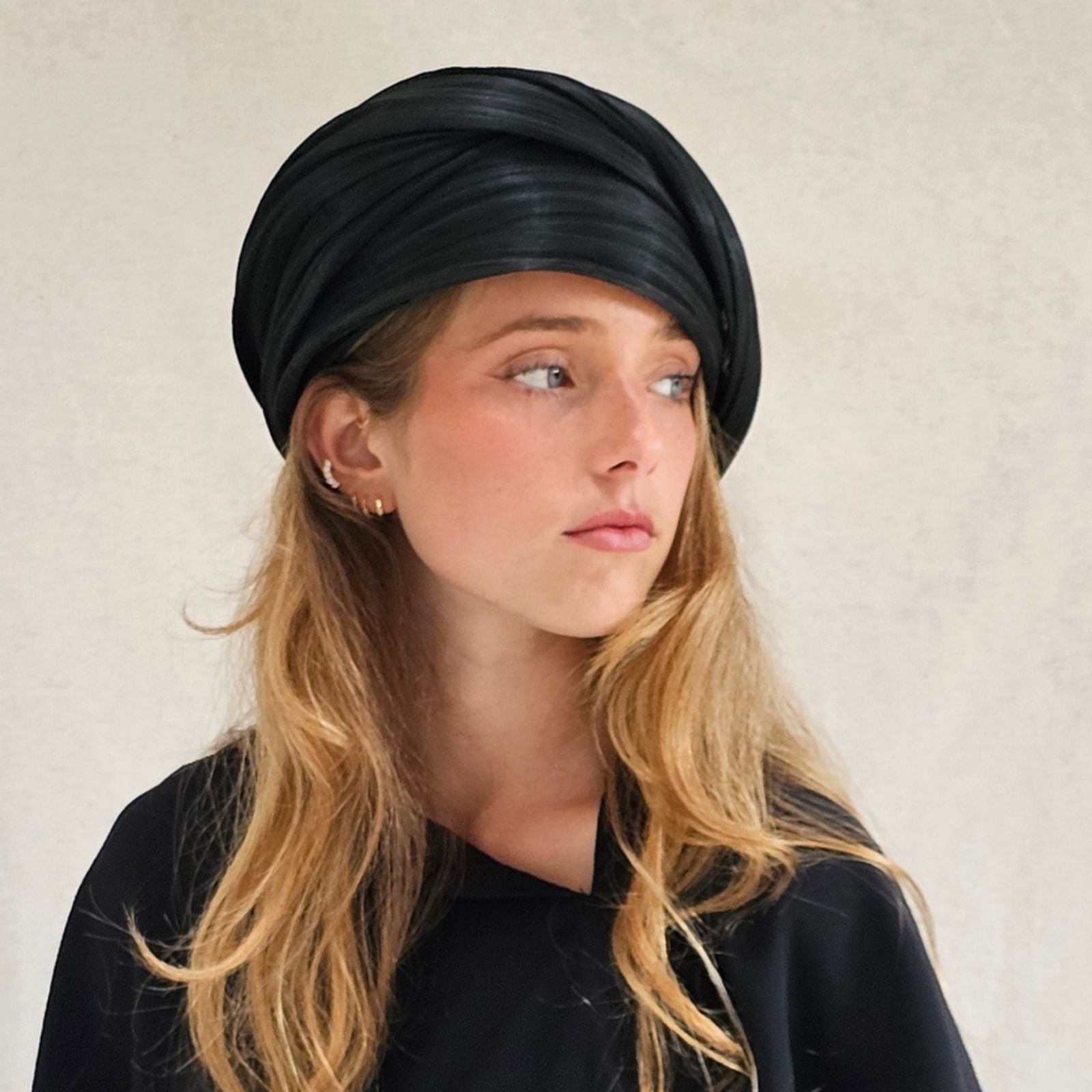 Black silk abaca turban with beautiful sheen, right view.