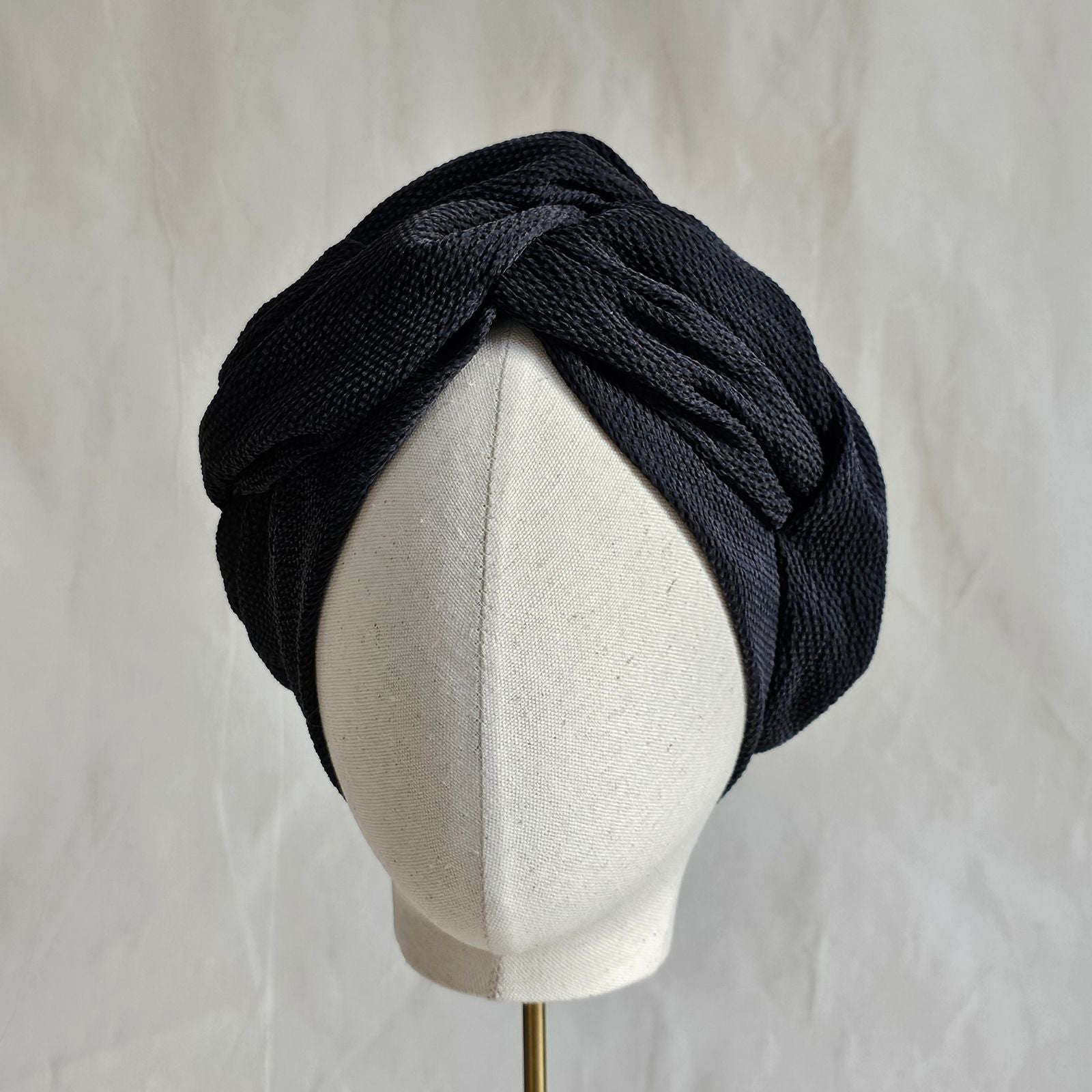 Black silk turban with beautiful shaping, front view.