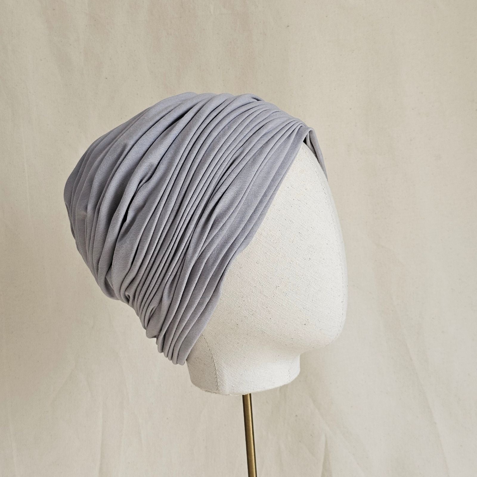 Grey cotton jersey turban with beautiful gathers, side view.