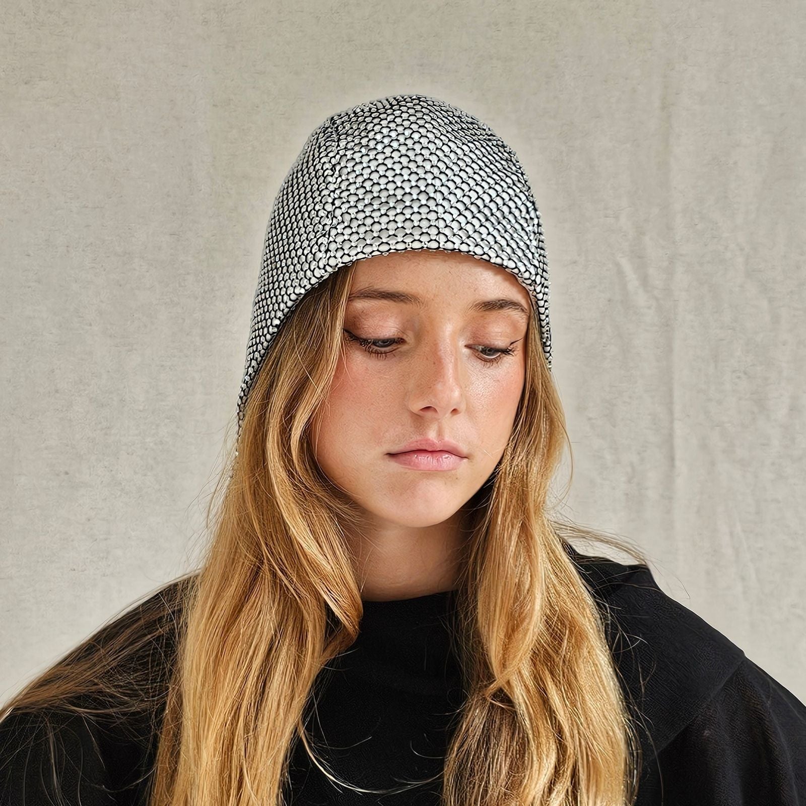 Ivory aviator cap with intricate crystal mesh, front view.