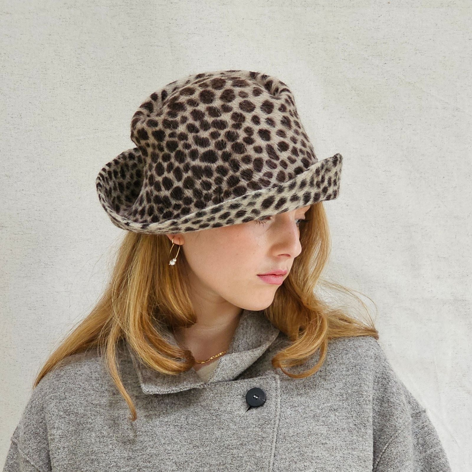 Leopard print felt trilby, side view.