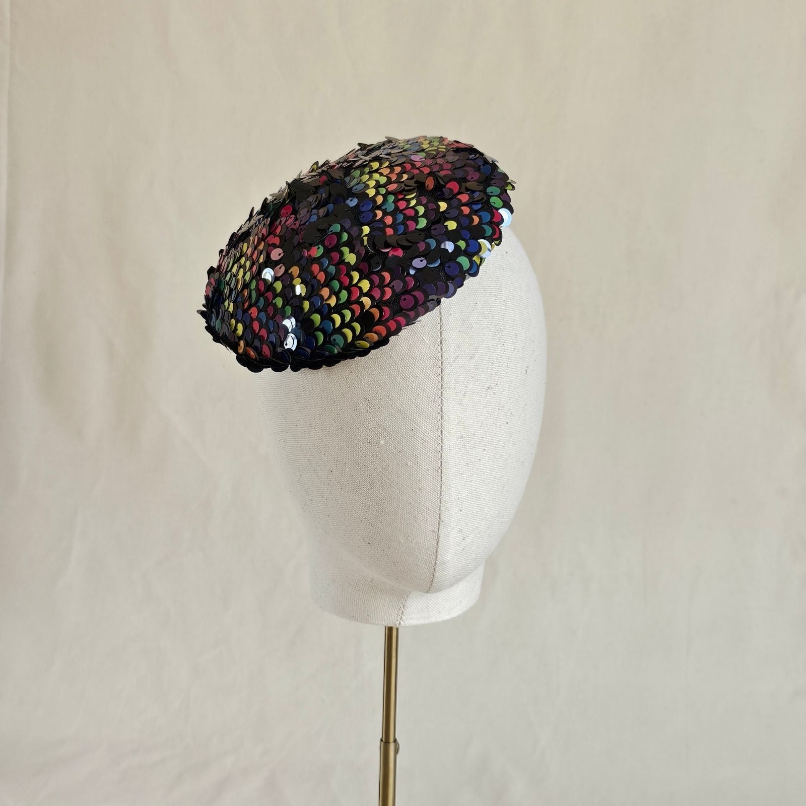 Multicoloured sequin beret, front view.