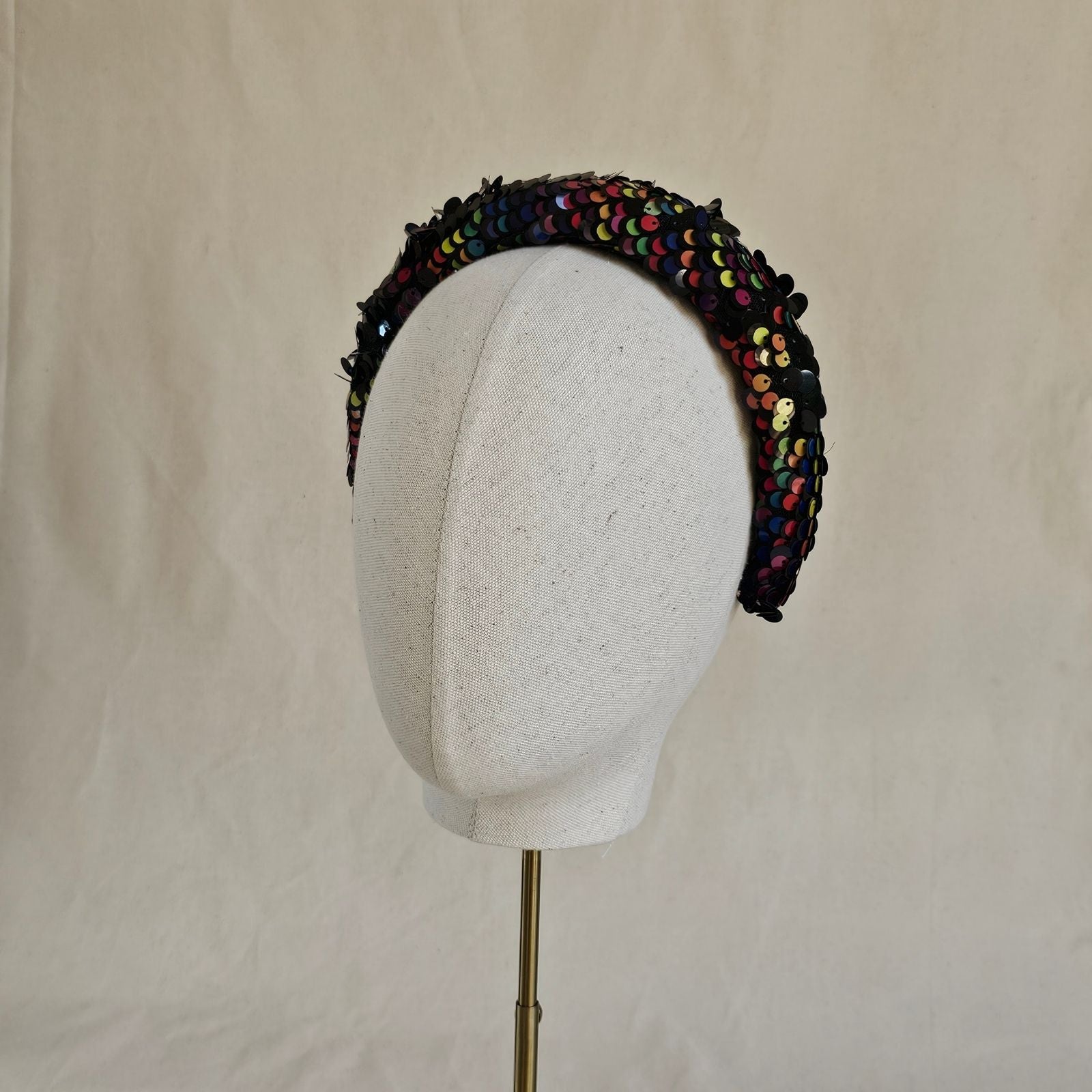 Multicolour sequin headband, left view.
