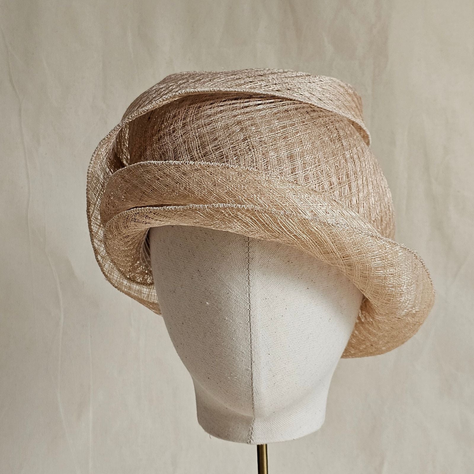 Natural mesh siname cloche hat, front view.