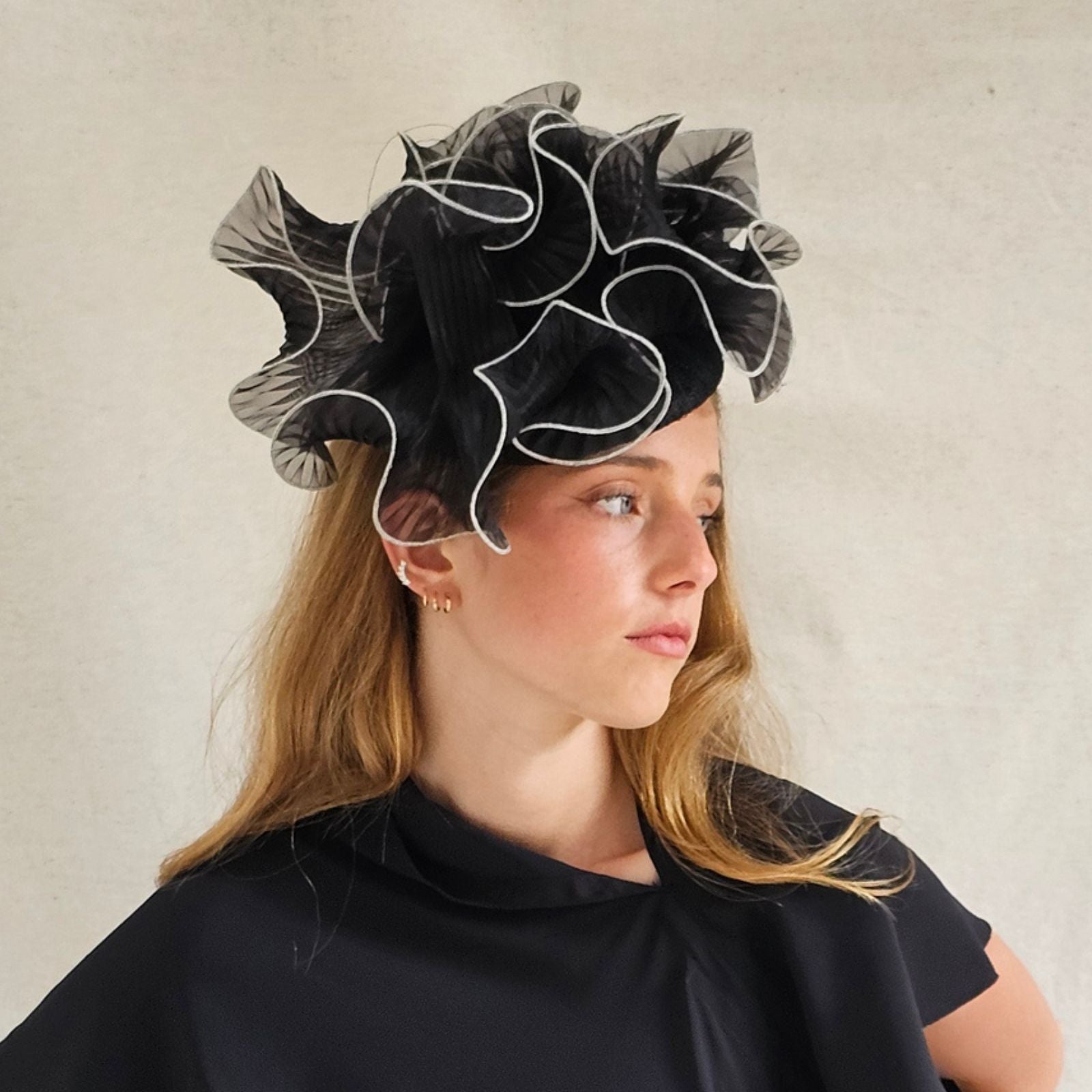 Black ivory organza ruffle hat, side view.