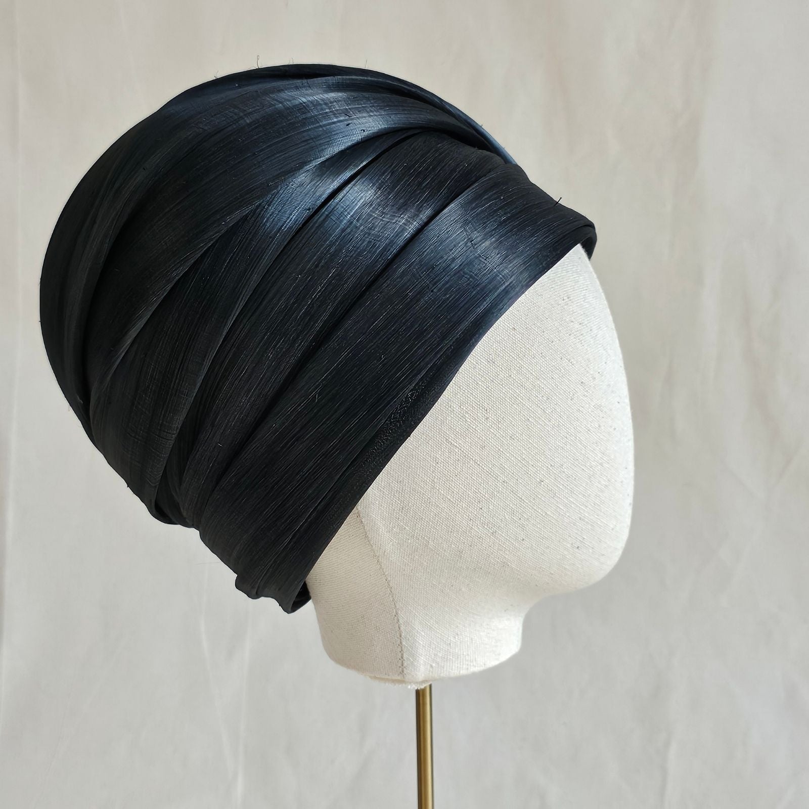 Black silk abaca turban with beautiful sheen, right view.