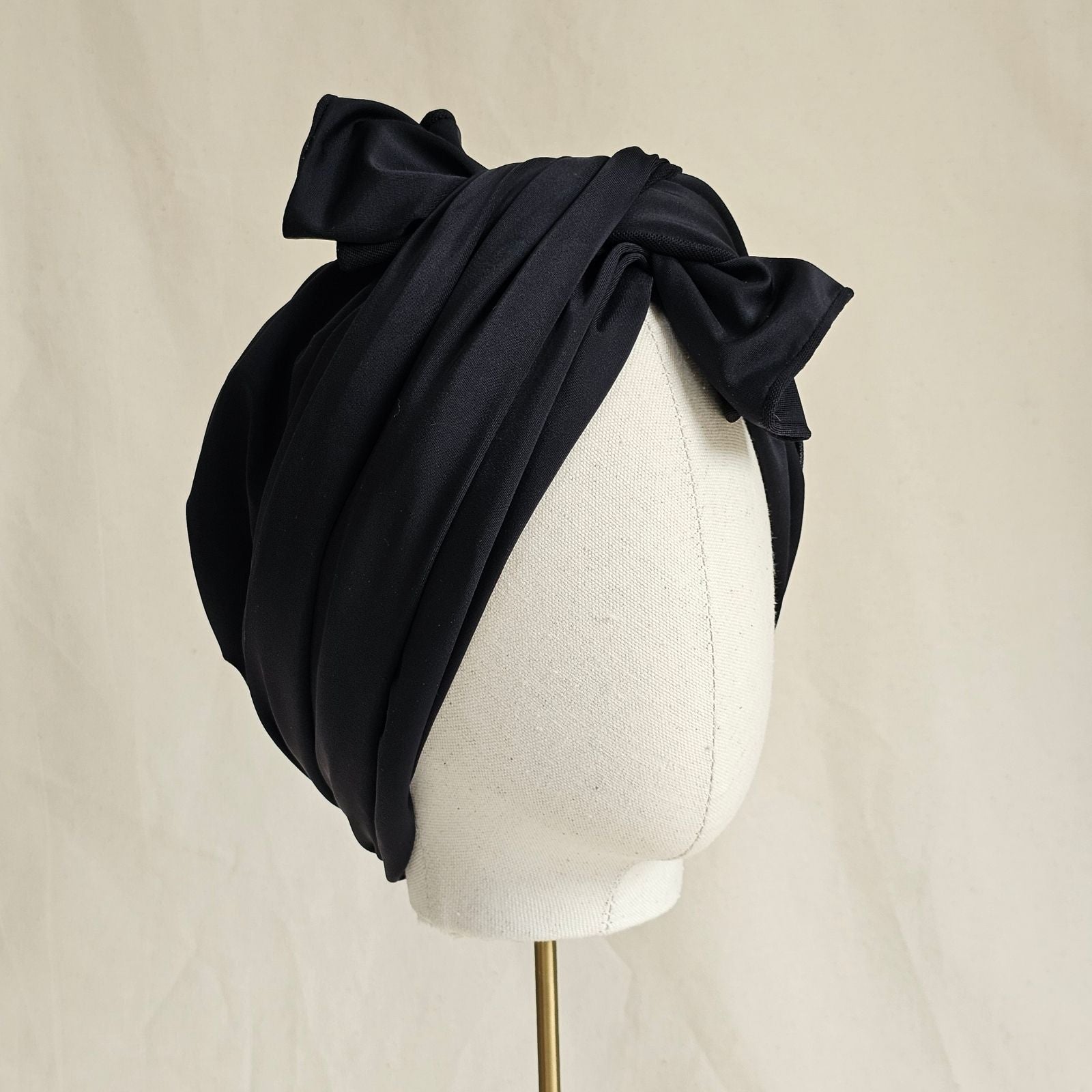 Black tie scarf beautiful swim turban, side view.