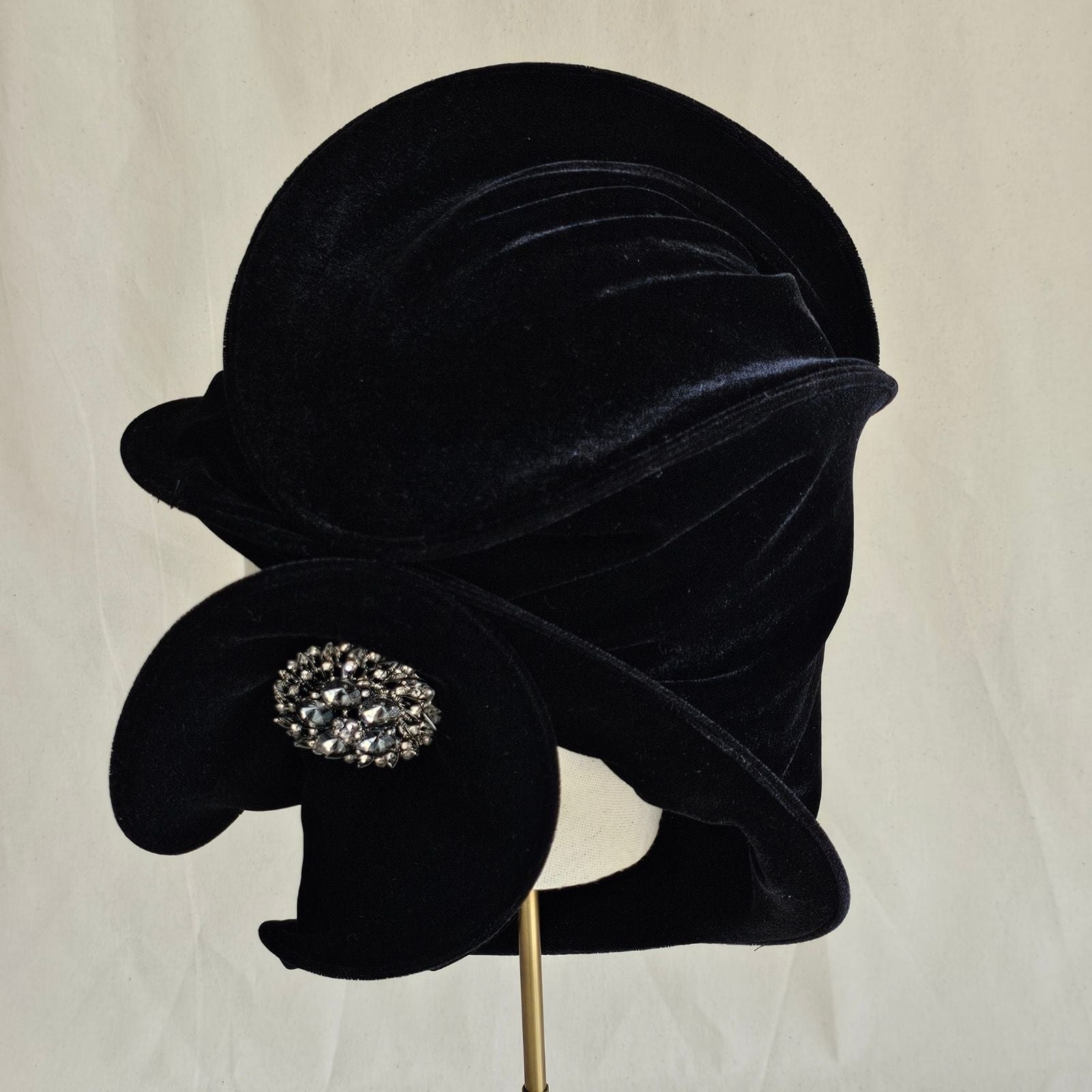 Black velvet scarf turban with beautiful brooch, back view.