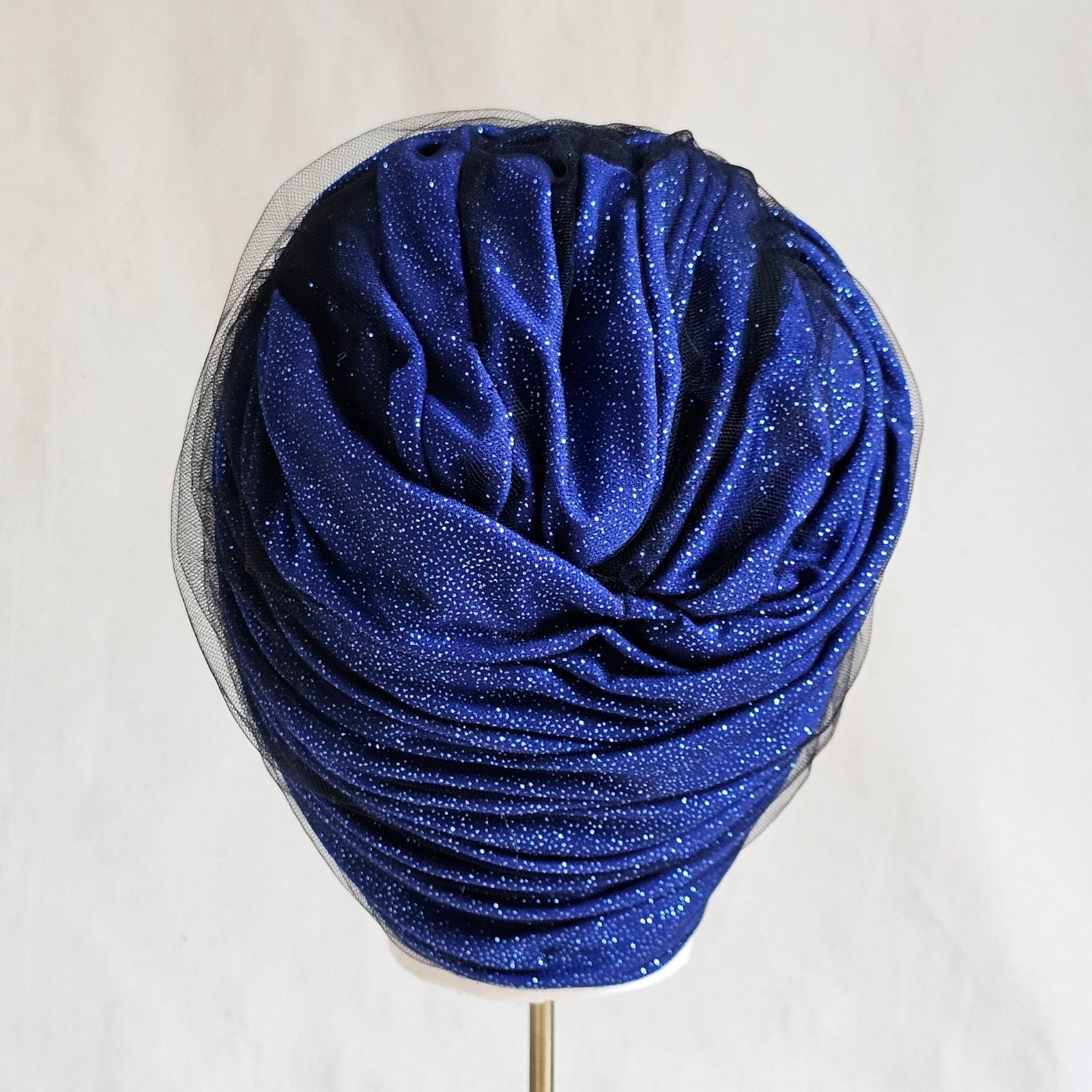 Blue sparkle turban with tulle, beautifully braided, back view.
