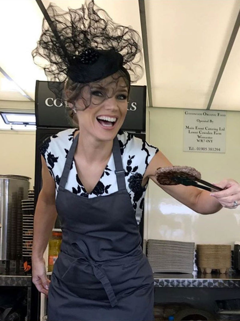 Charlotte Hawkins wearing a Nerida Fraiman black beret with crin veil at Royal Ascot.