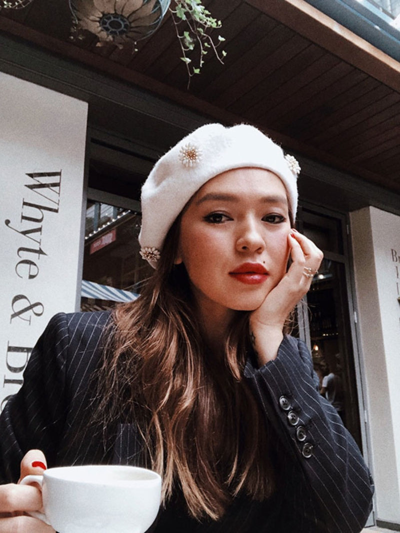 Chynara Kojoeva Chykapuka wearing Nerida Fraiman white beret.