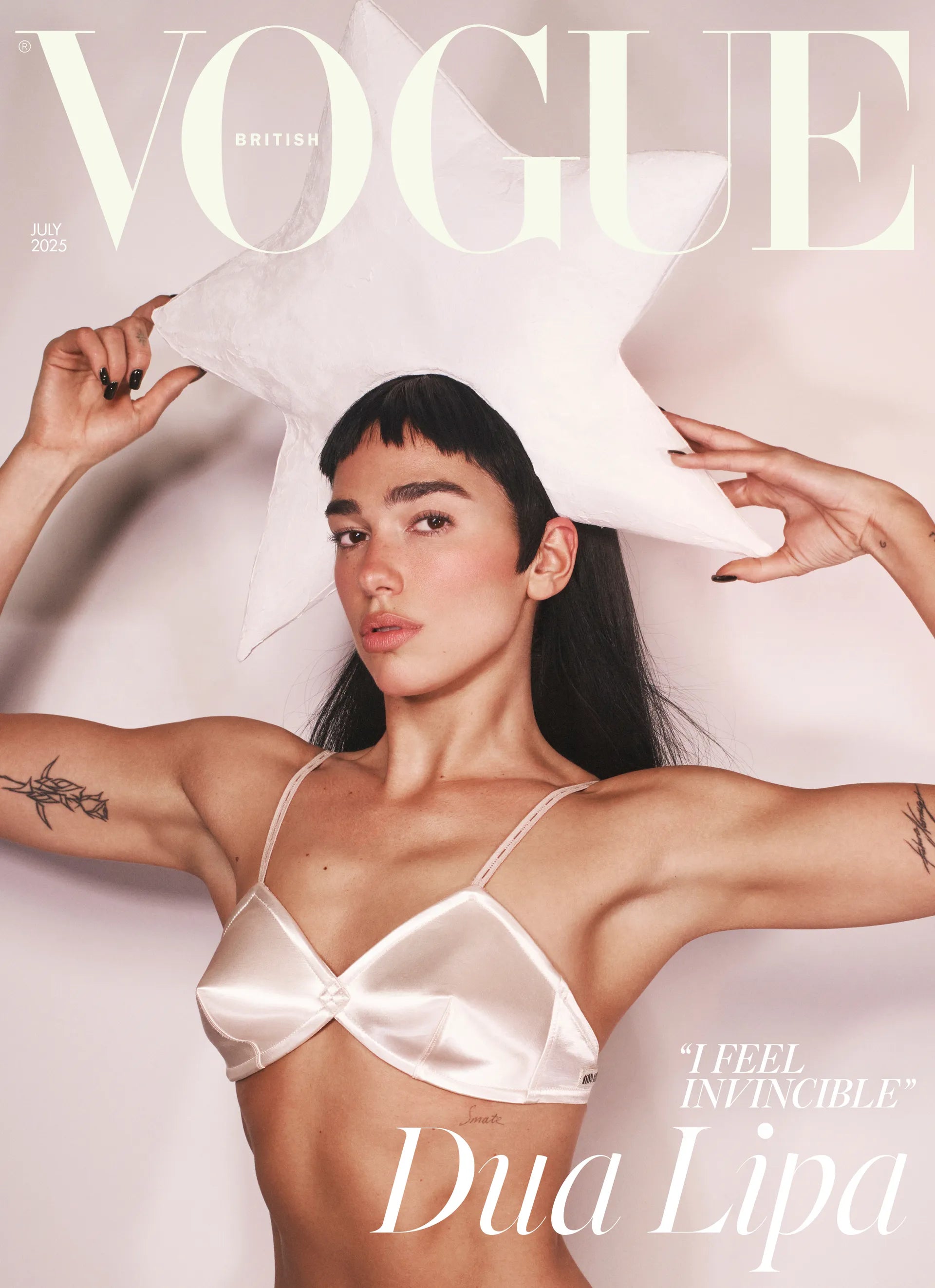 Dua Lipa wearing Nerida Fraiman star hat on the Vogue 2025 cover.