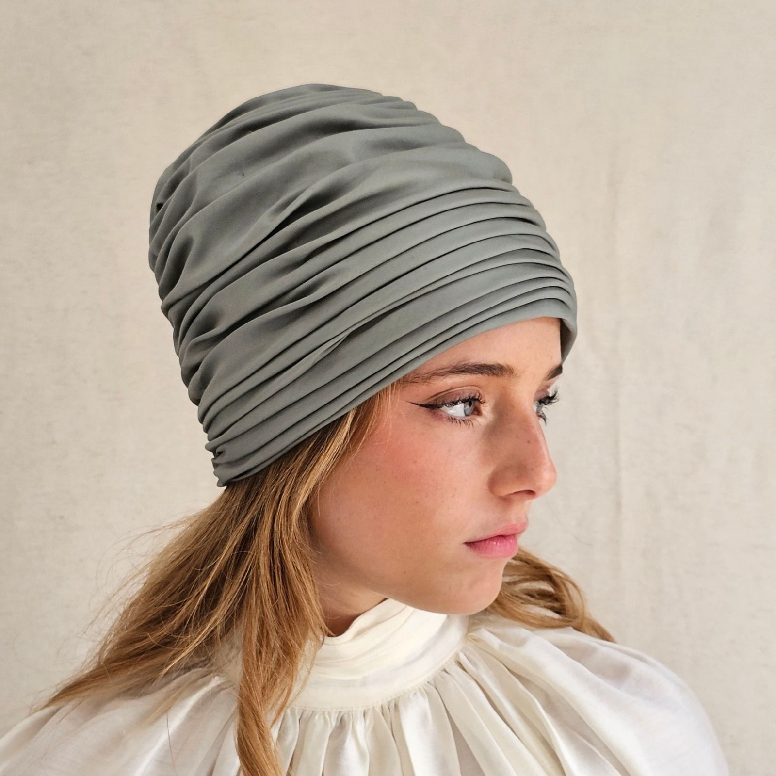 Green cotton gathered turban, right view.