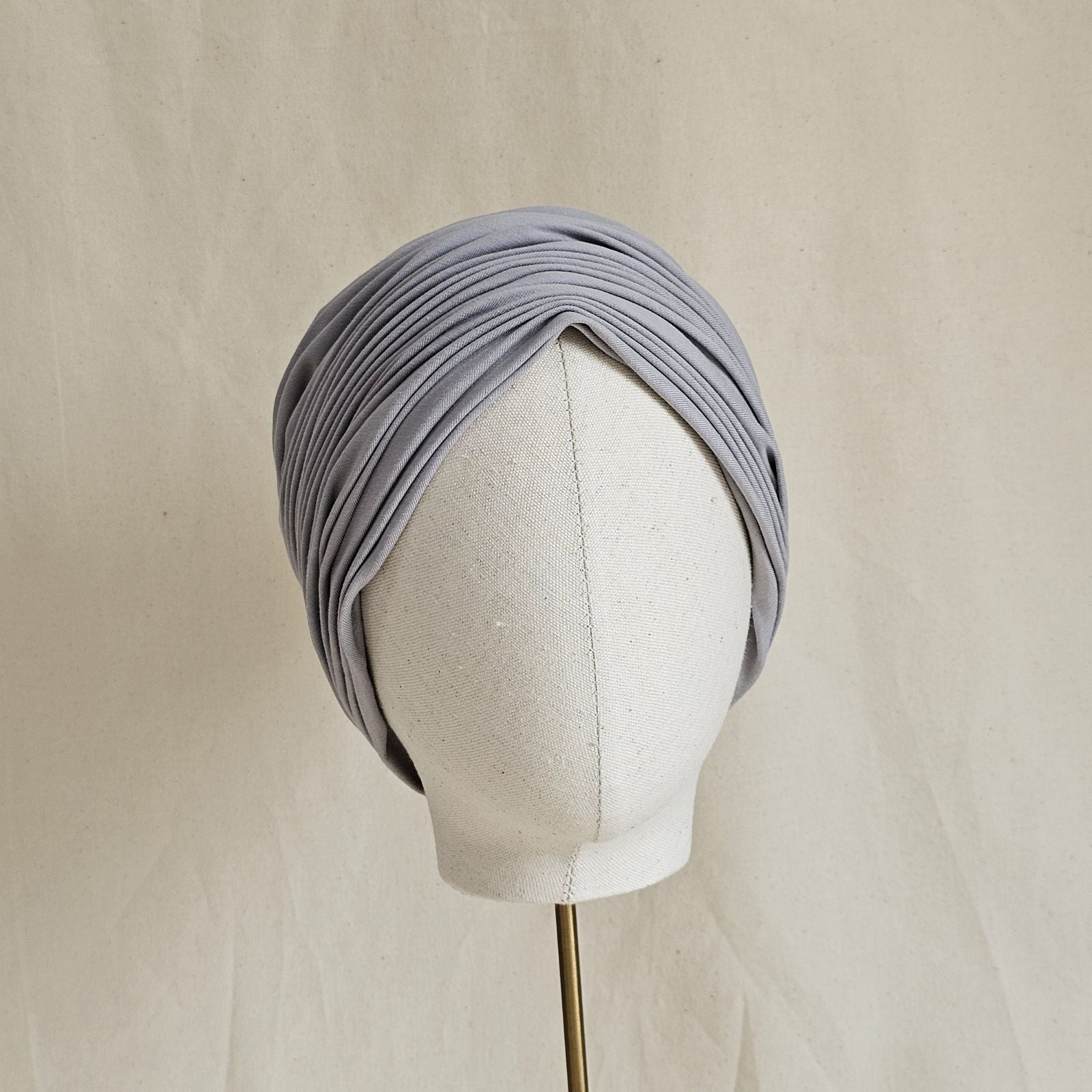 Grey cotton jersey turban with beautiful gathers, front view.