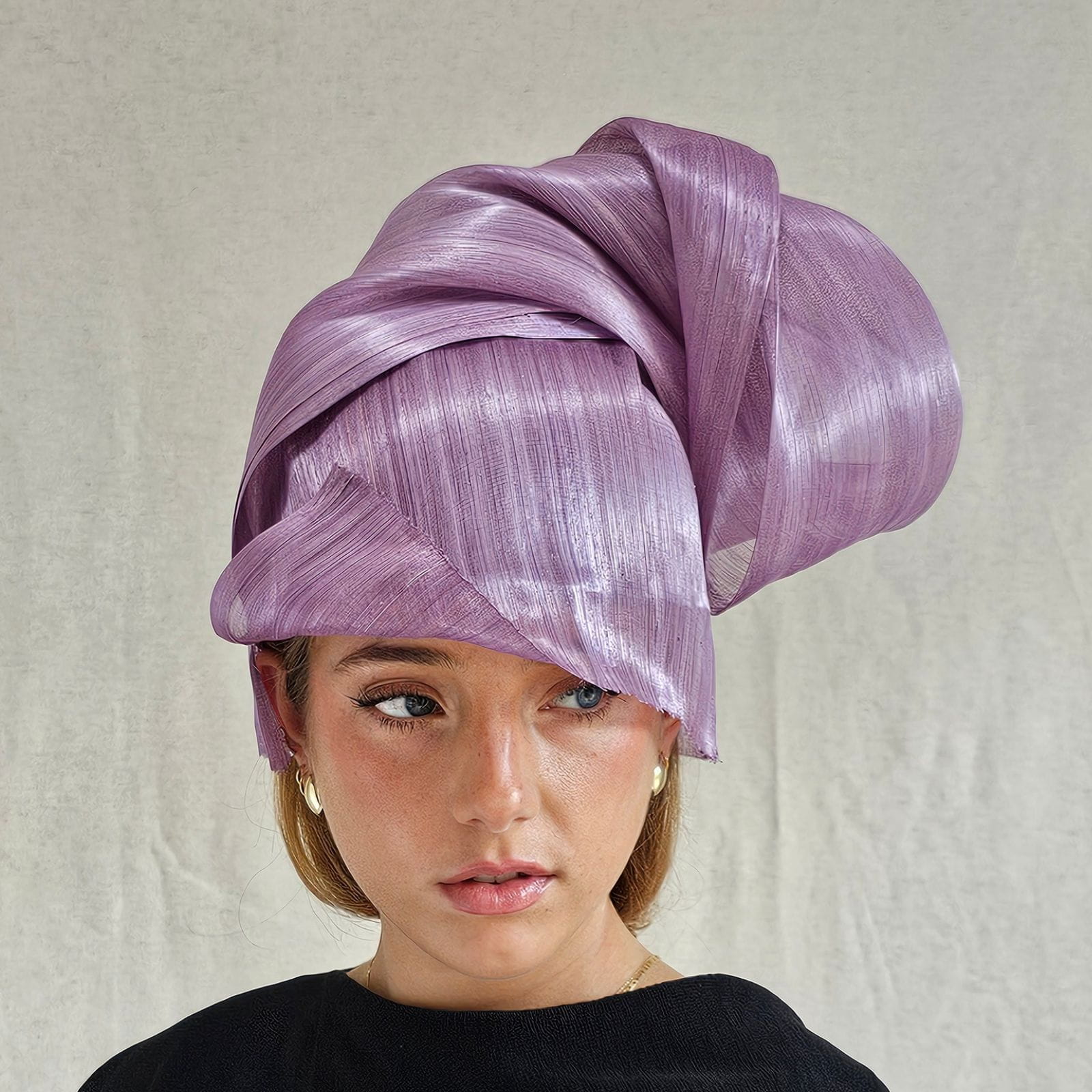 Lilac silk abaca chignon hat, front view.