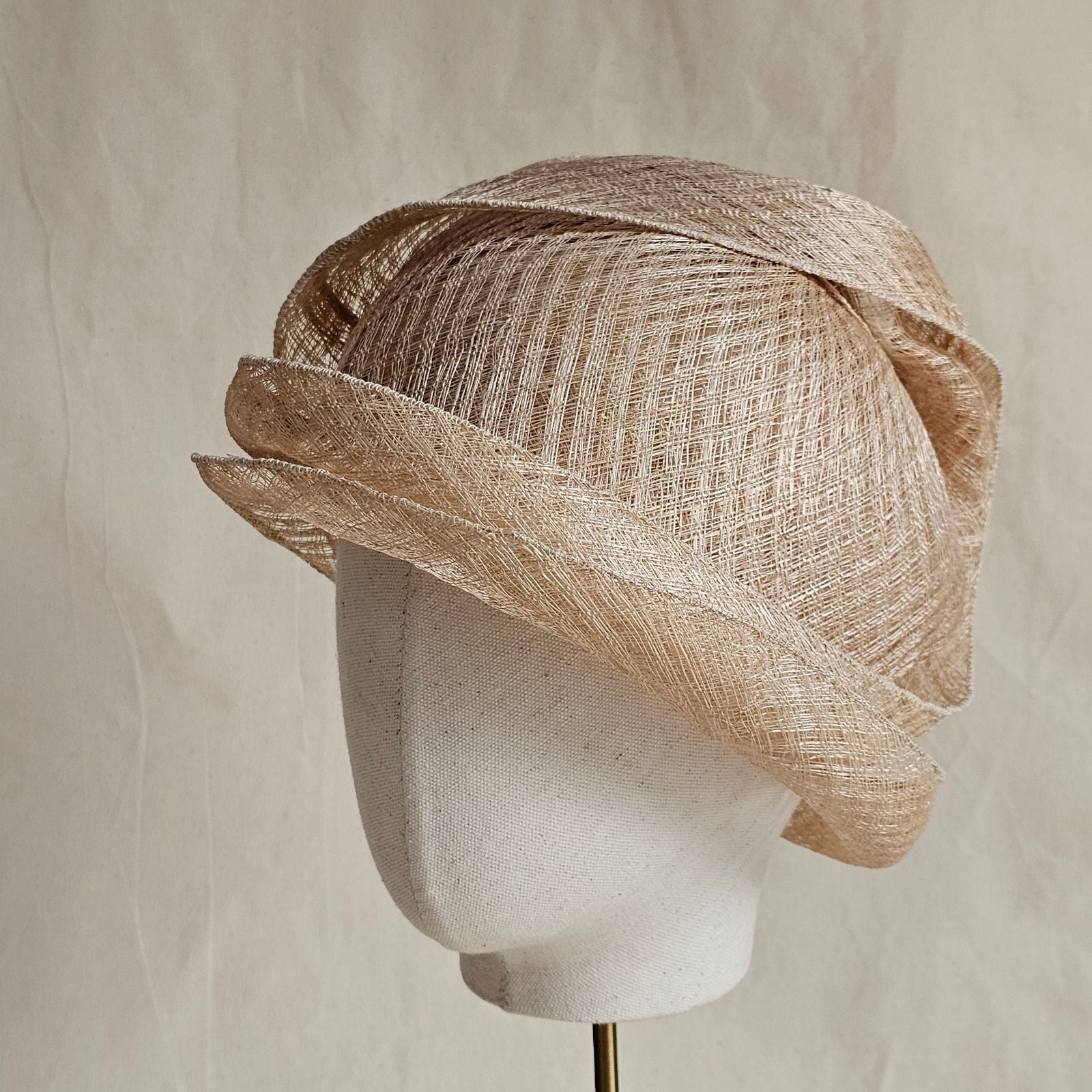 Natural mesh siname cloche hat, left view.