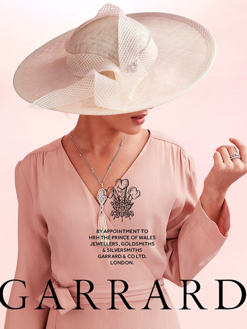 Model wearing Nerida Fraiman ascot hat for Garrard.