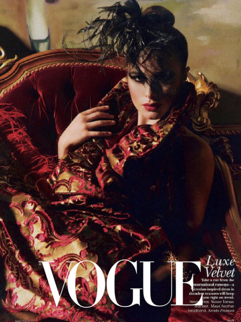 Model wearing Nerida Fraiman feather fascinator for Vogue magazine.