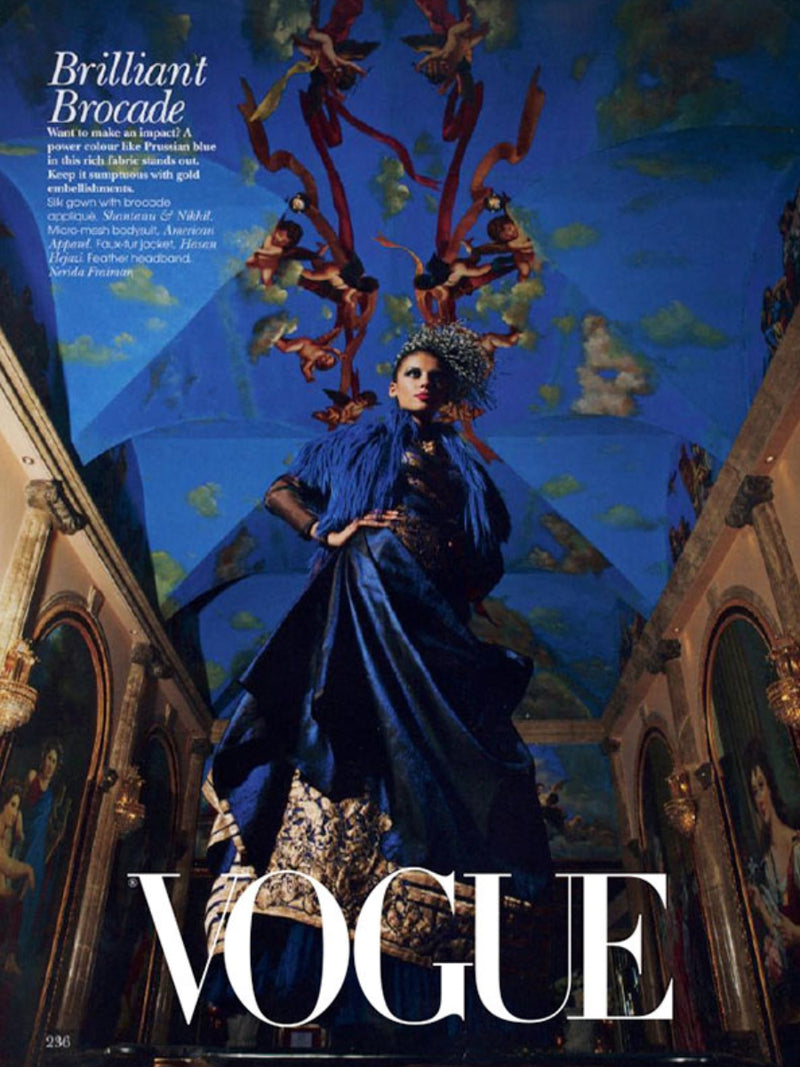 Model wearing Nerida Fraiman feather fascinator for Vogue magazine.