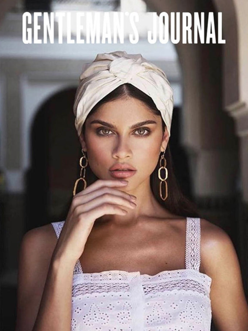 Model wearing Nerida Fraiman ivory turban for Gentleman’s Journal.