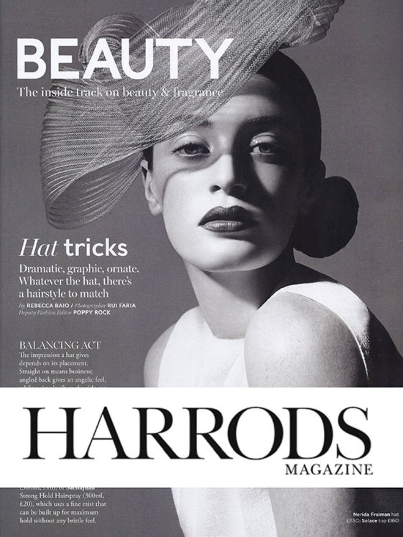 Model wearing Nerida Fraiman silver hat for Harrods magazine.