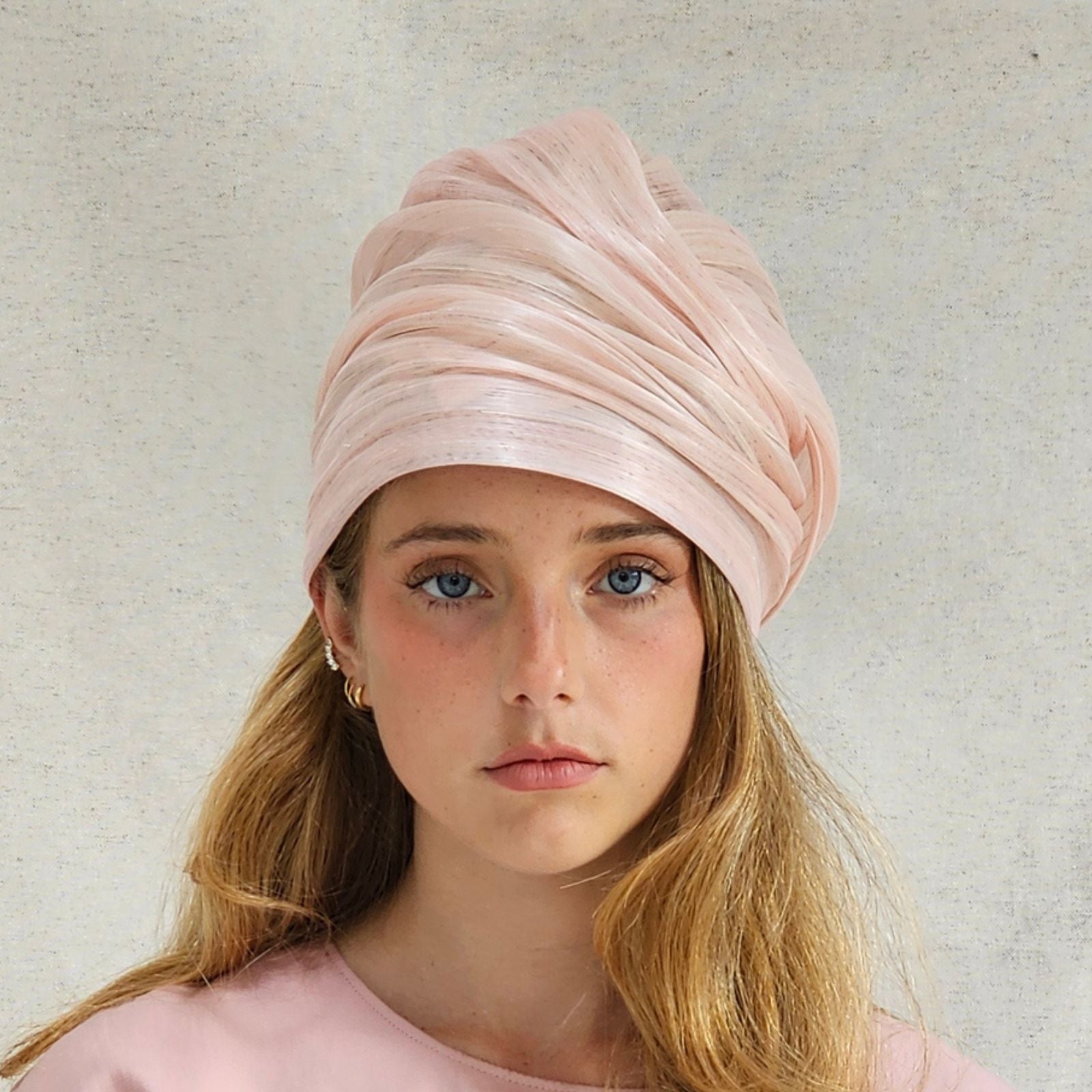 Pink silk abaca turban with beautiful sheen, front view.