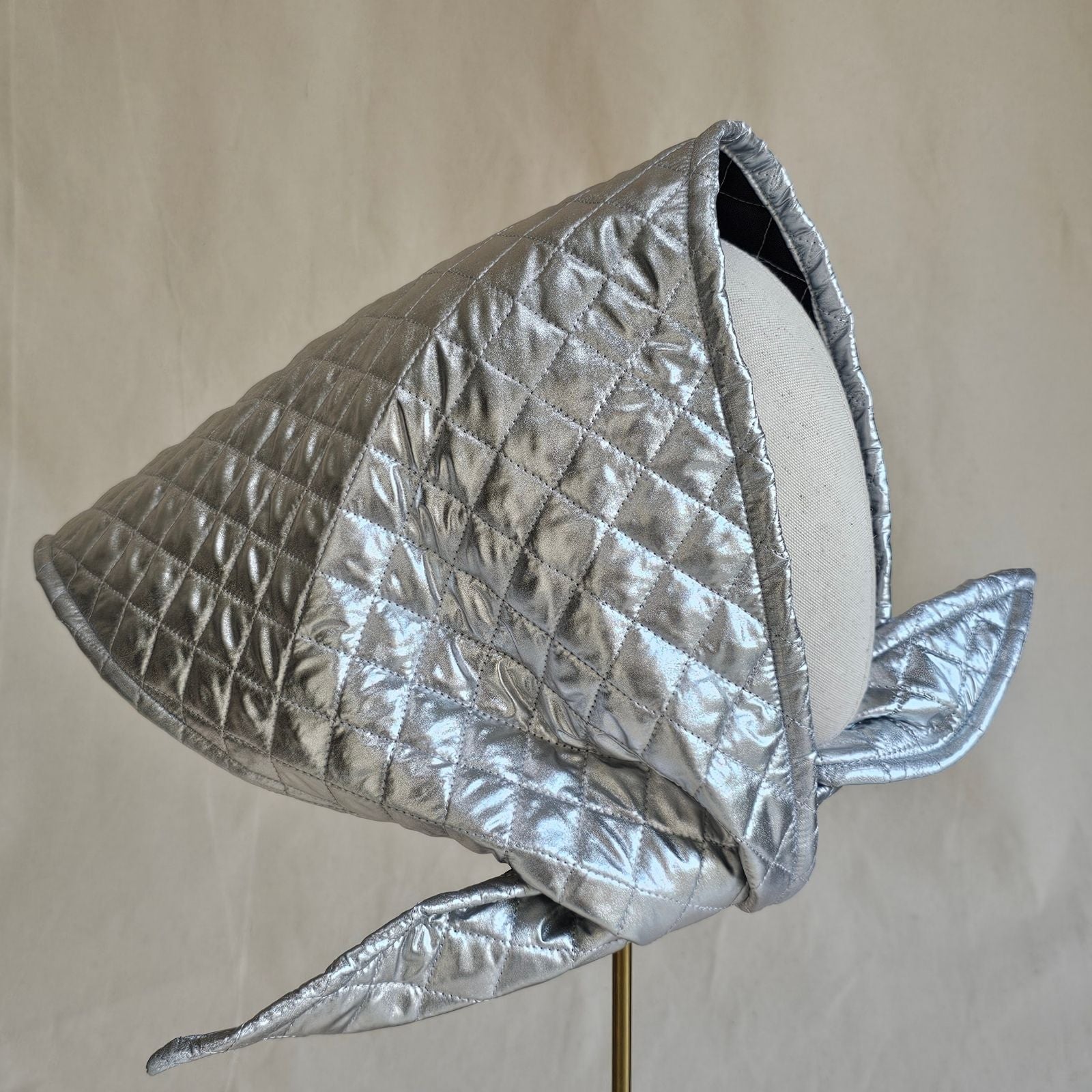 Silver quilted scarf hat, right view.