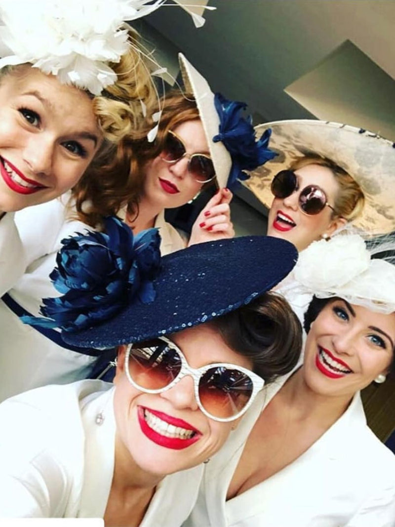 The Tootsie Rollers wearing ivory, cream and navy Nerida Fraiman hats at Royal Ascot.